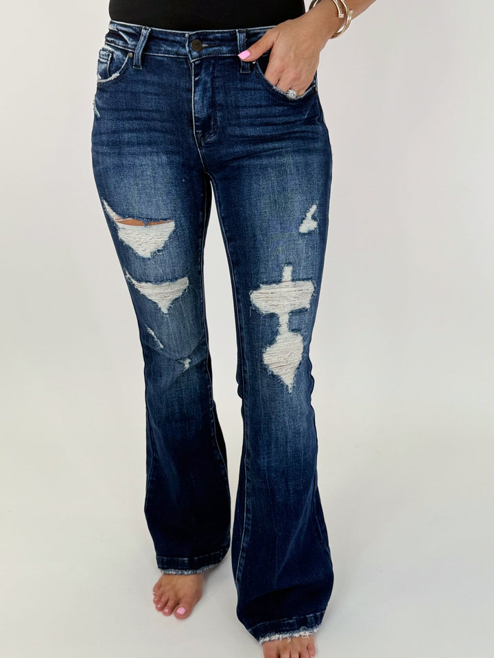 Chloe Mid Rise Flare Trouser hem jeans